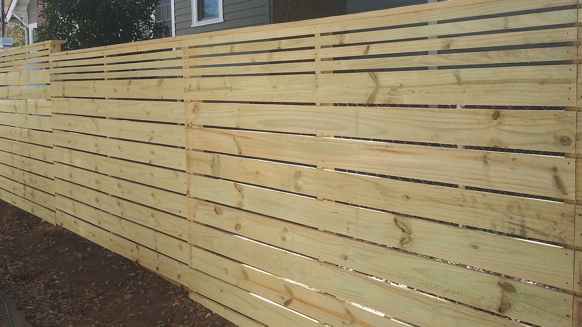 An example of a project completed by Etowah Fences, a company that offers outdoor property improvement services like fencing, gates, pergolas, sheds, chicken coops and more in Metro Atlanta and North Georgia